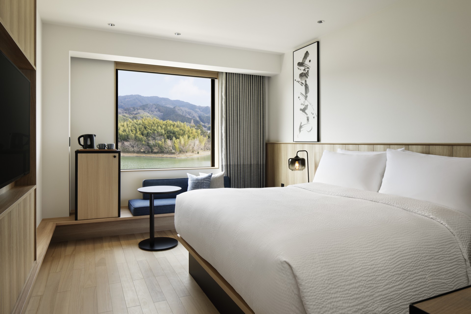 a room with a bed and a window