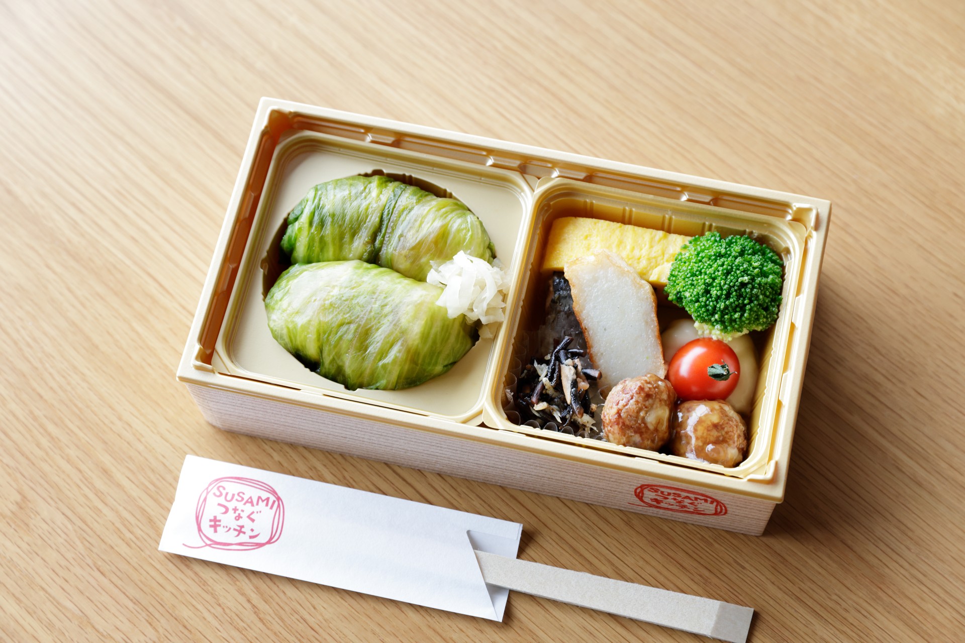 a lunch box with food in it
