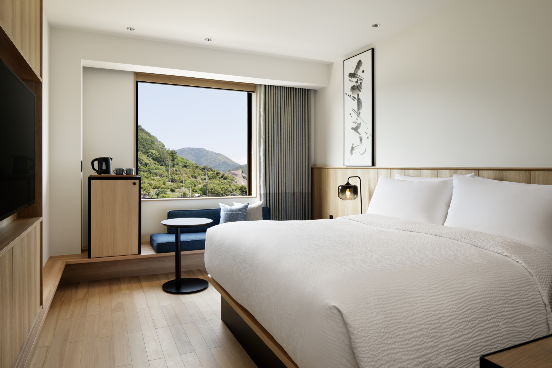 a room with a bed and a window