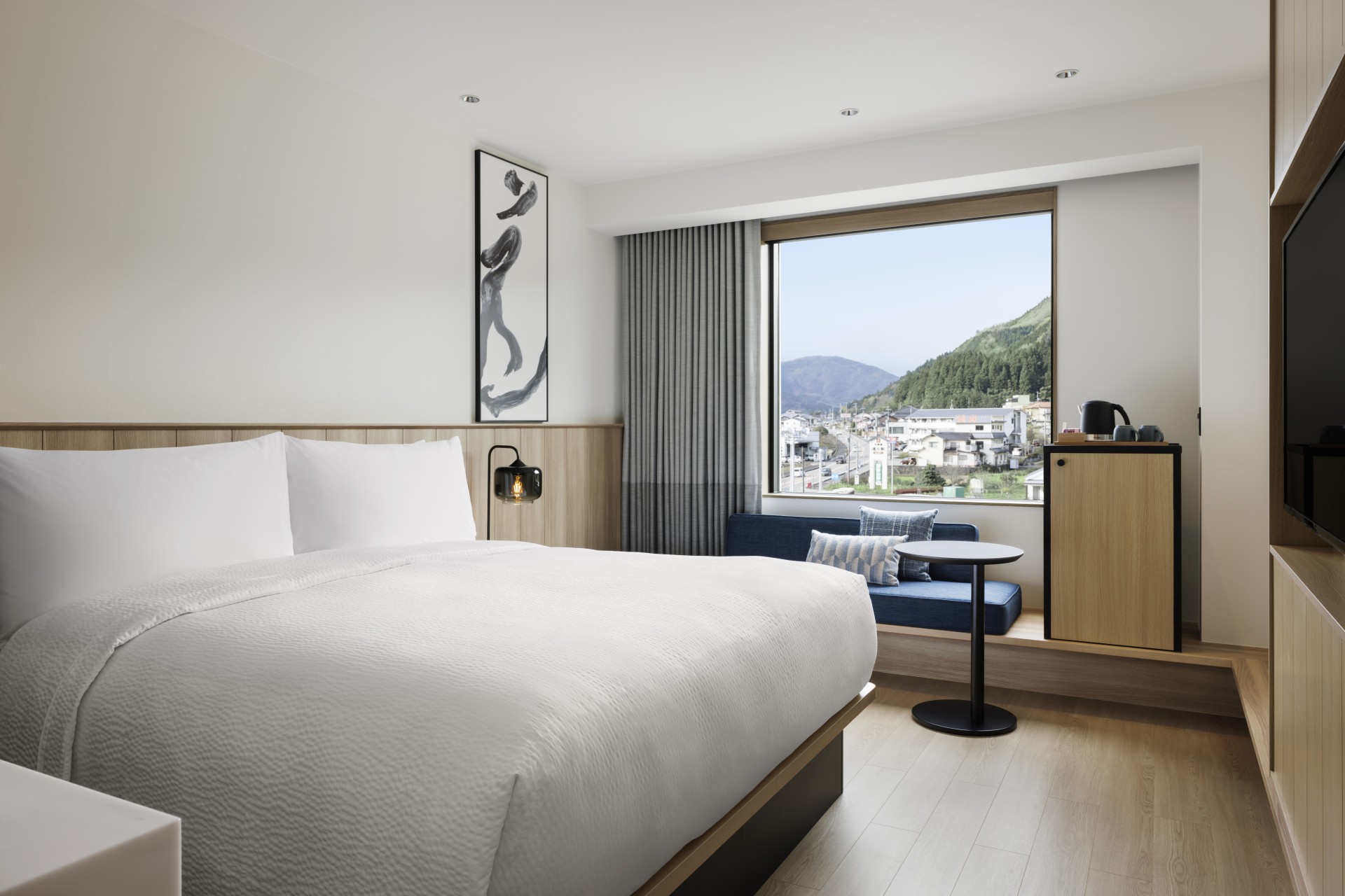 a room with a bed and a window