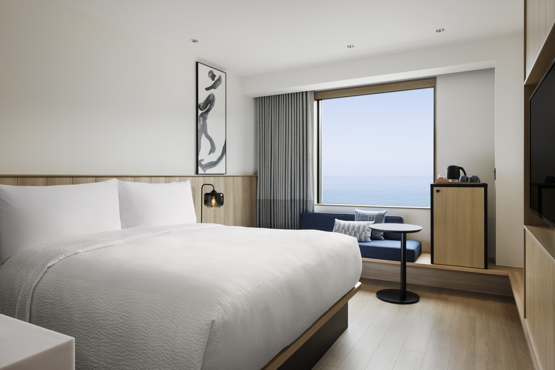 a room with a bed and a window