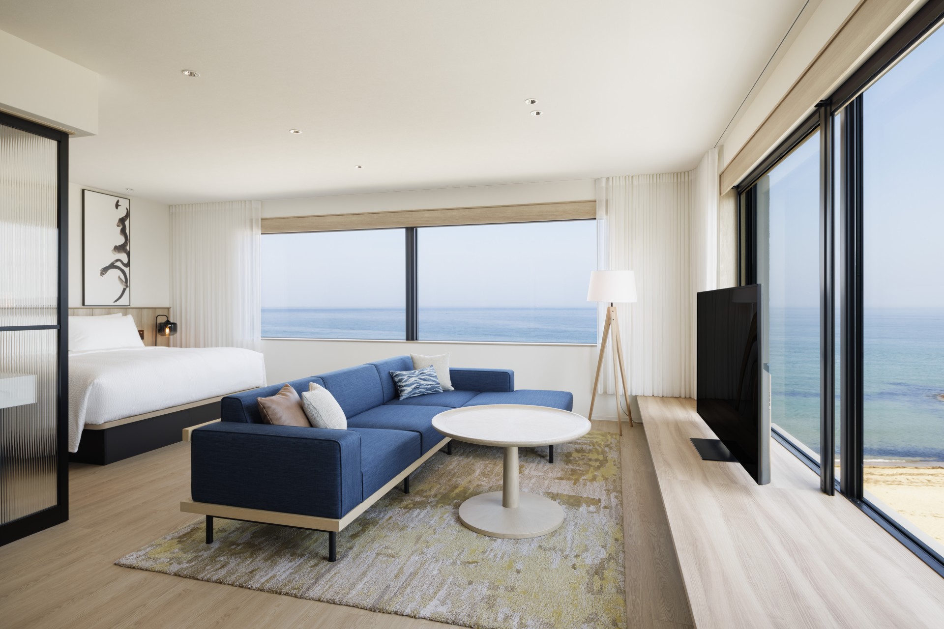 a room with a couch and a television