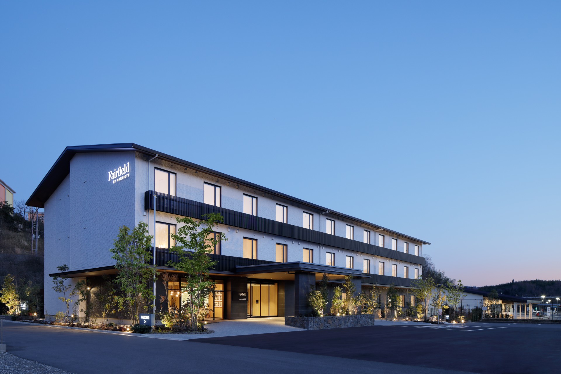 a building with a lot of trees