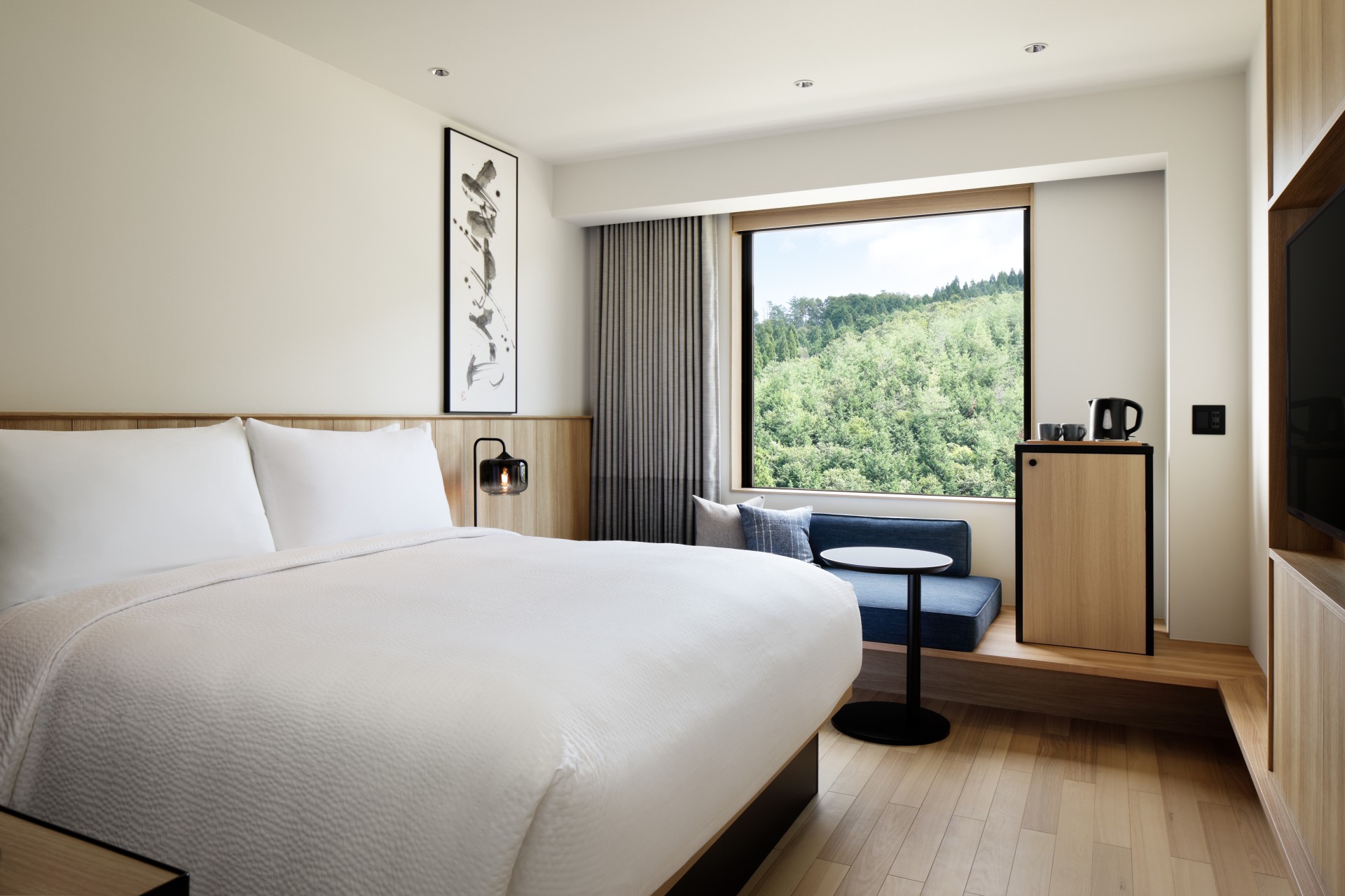 a room with a bed and a window