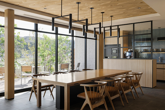 a room with a table and chairs