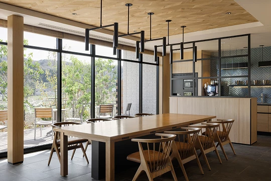 a room with a table and chairs