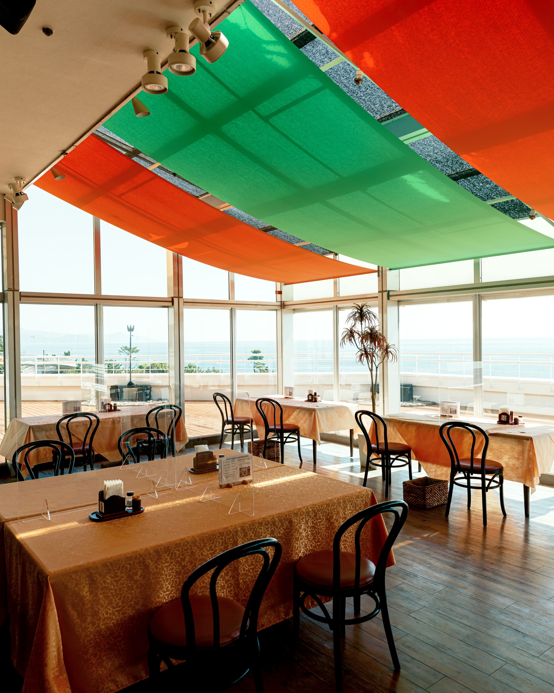 a room with tables and chairs
