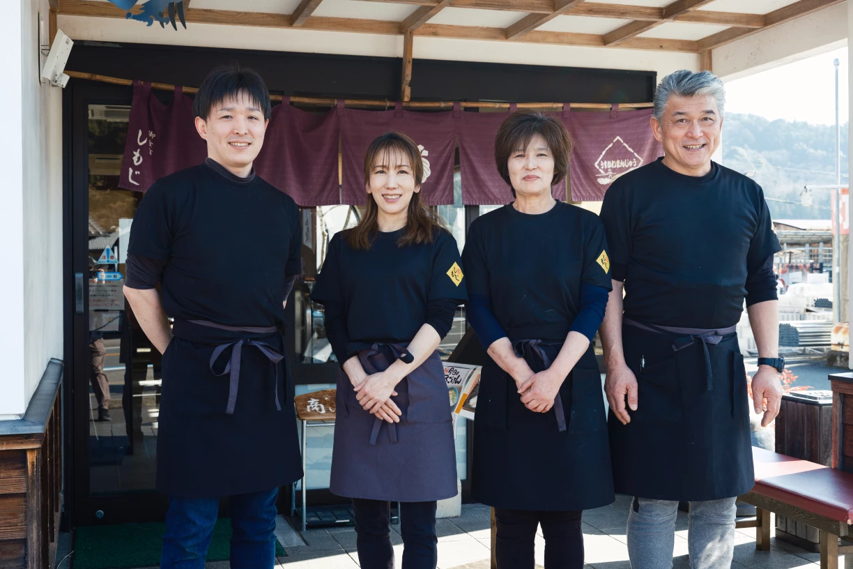 a group of people standing outside