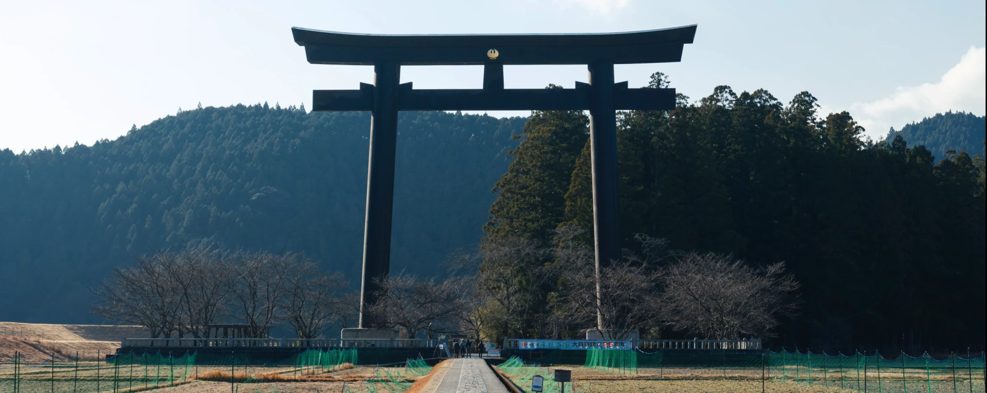 a large black arch over a road