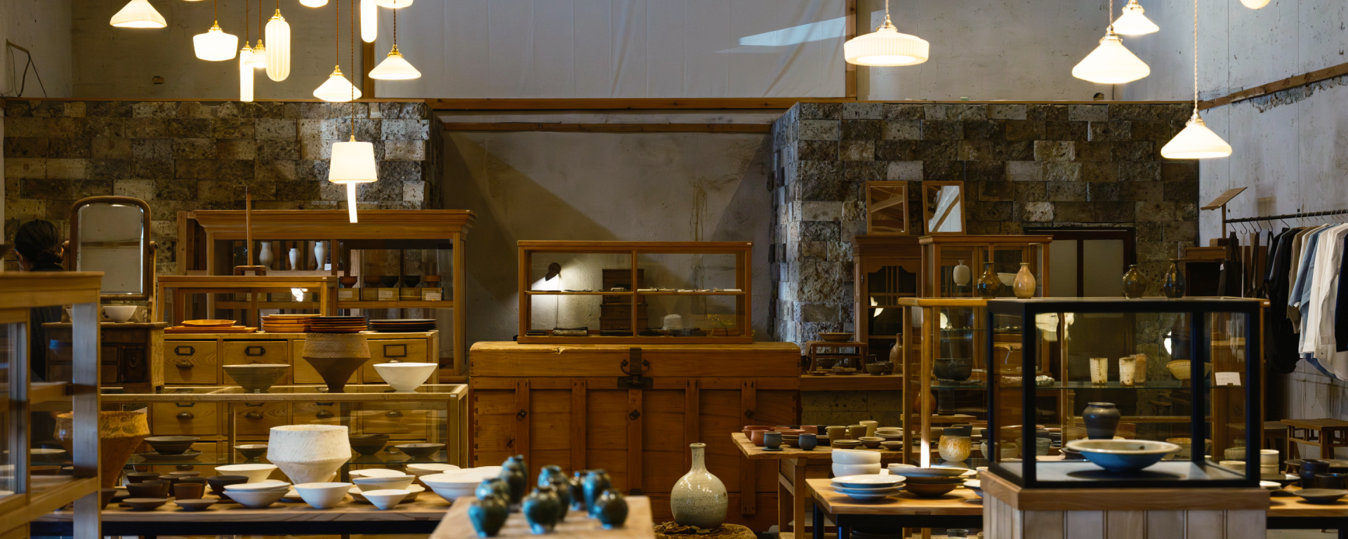 a room with a stone wall and a stone wall and a stone wall