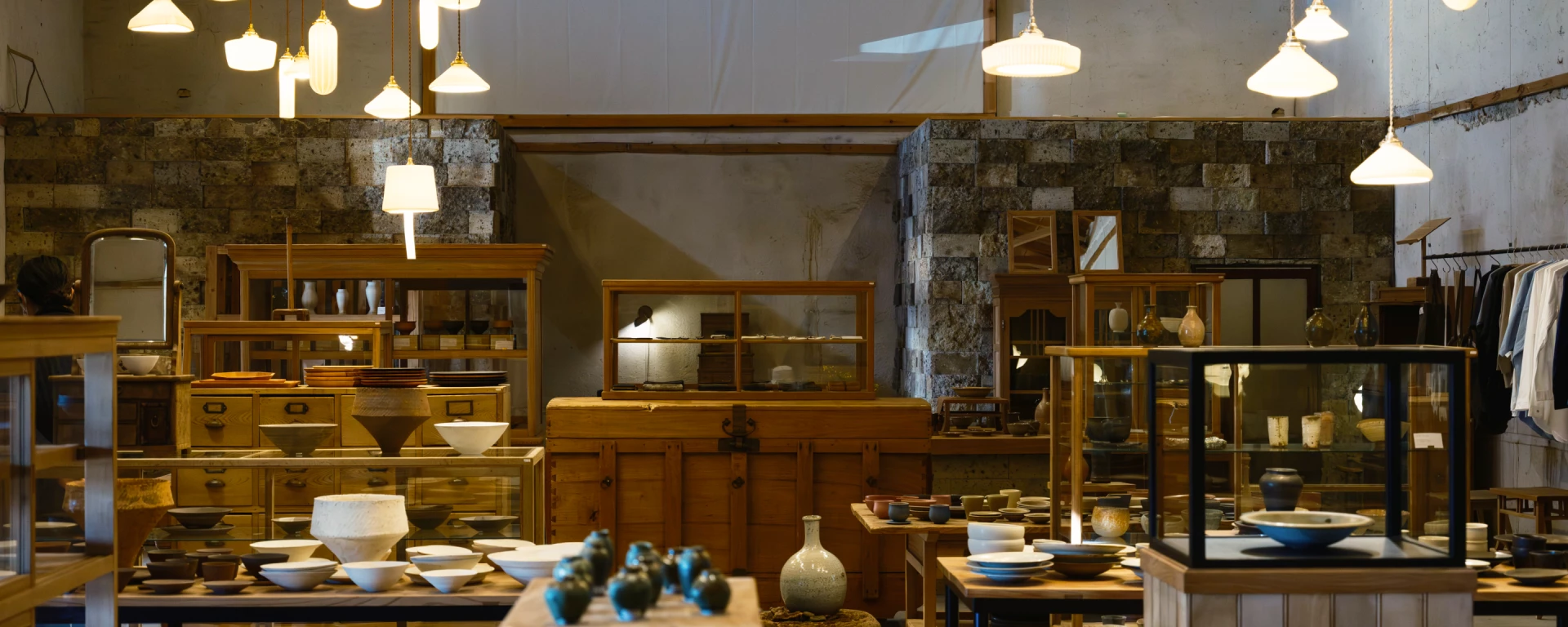 a room with a stone wall and a stone wall and a stone wall