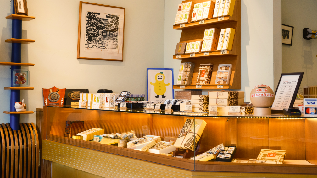 a display case with boxes of food on it