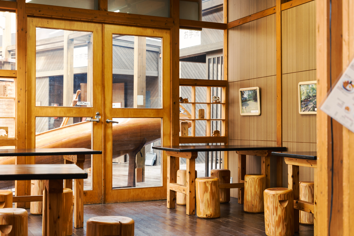 a room with tables and chairs