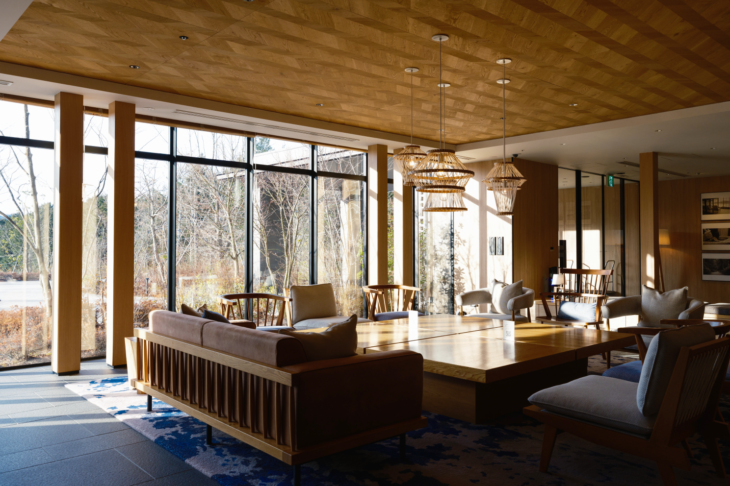 a room with a large table and chairs