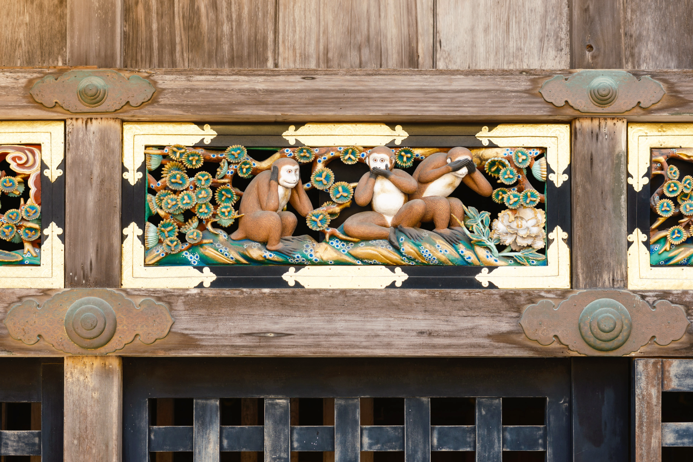 a wood panel with monkeys on it