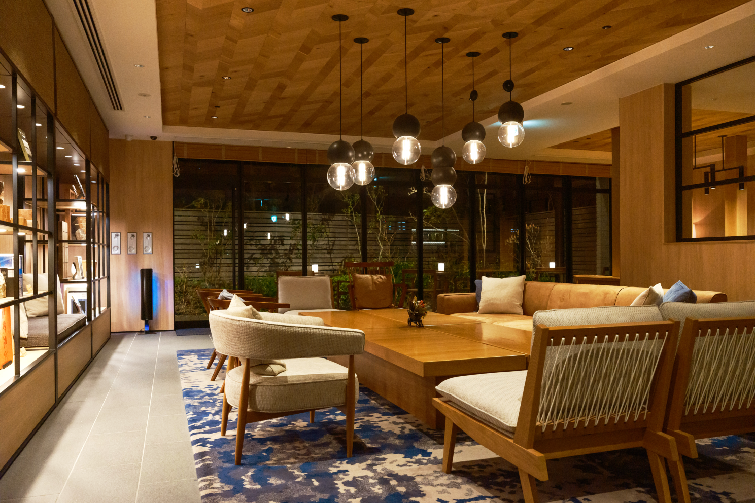 a room with a large table and chairs