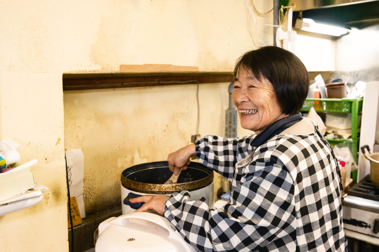a woman smiling at the camera