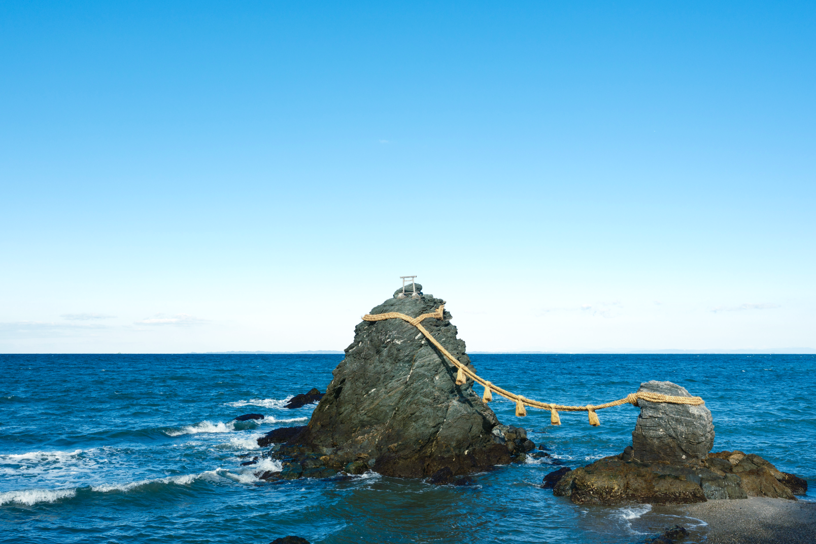 a rock with rope and a rope tied to it