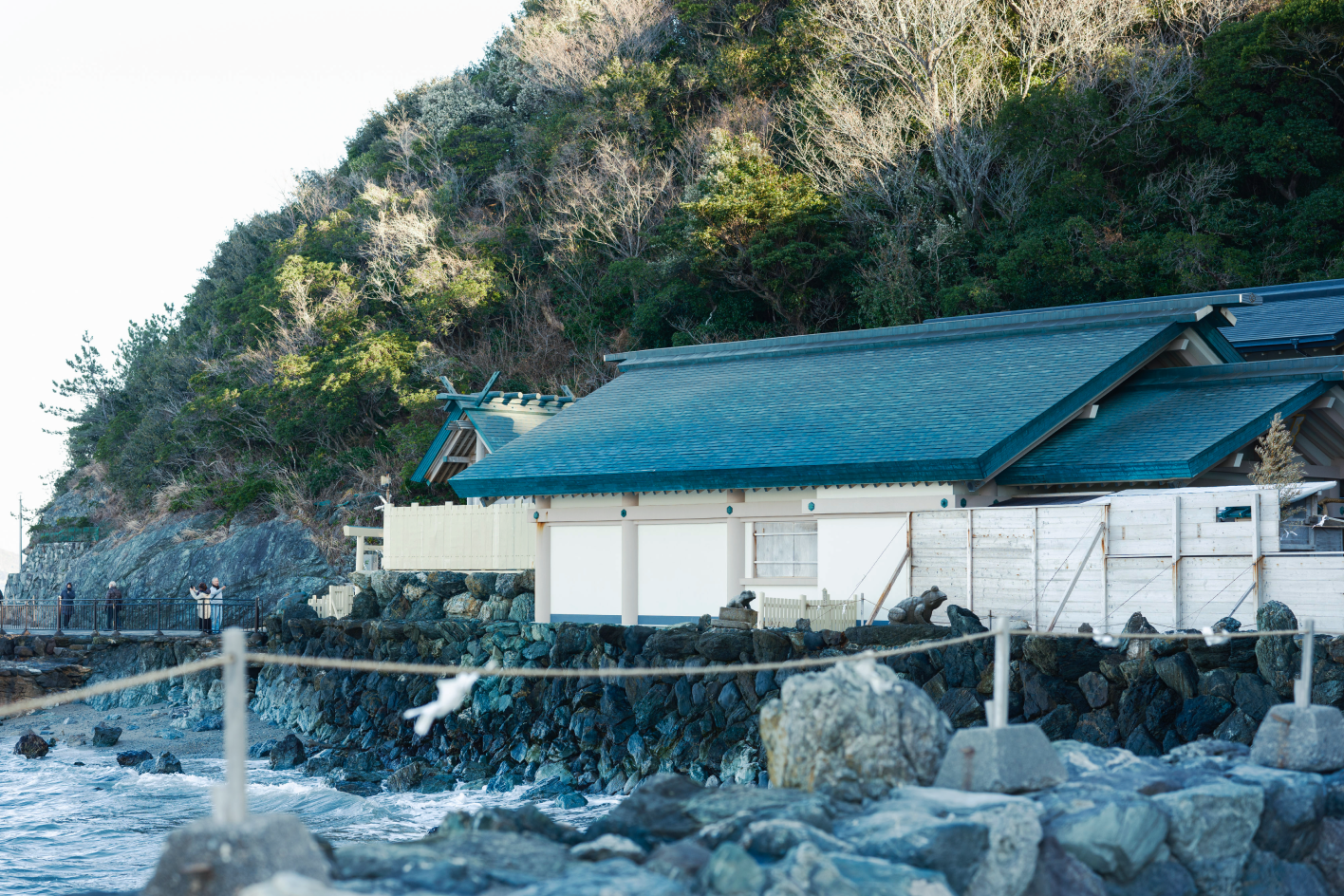 a house on a rocky shore