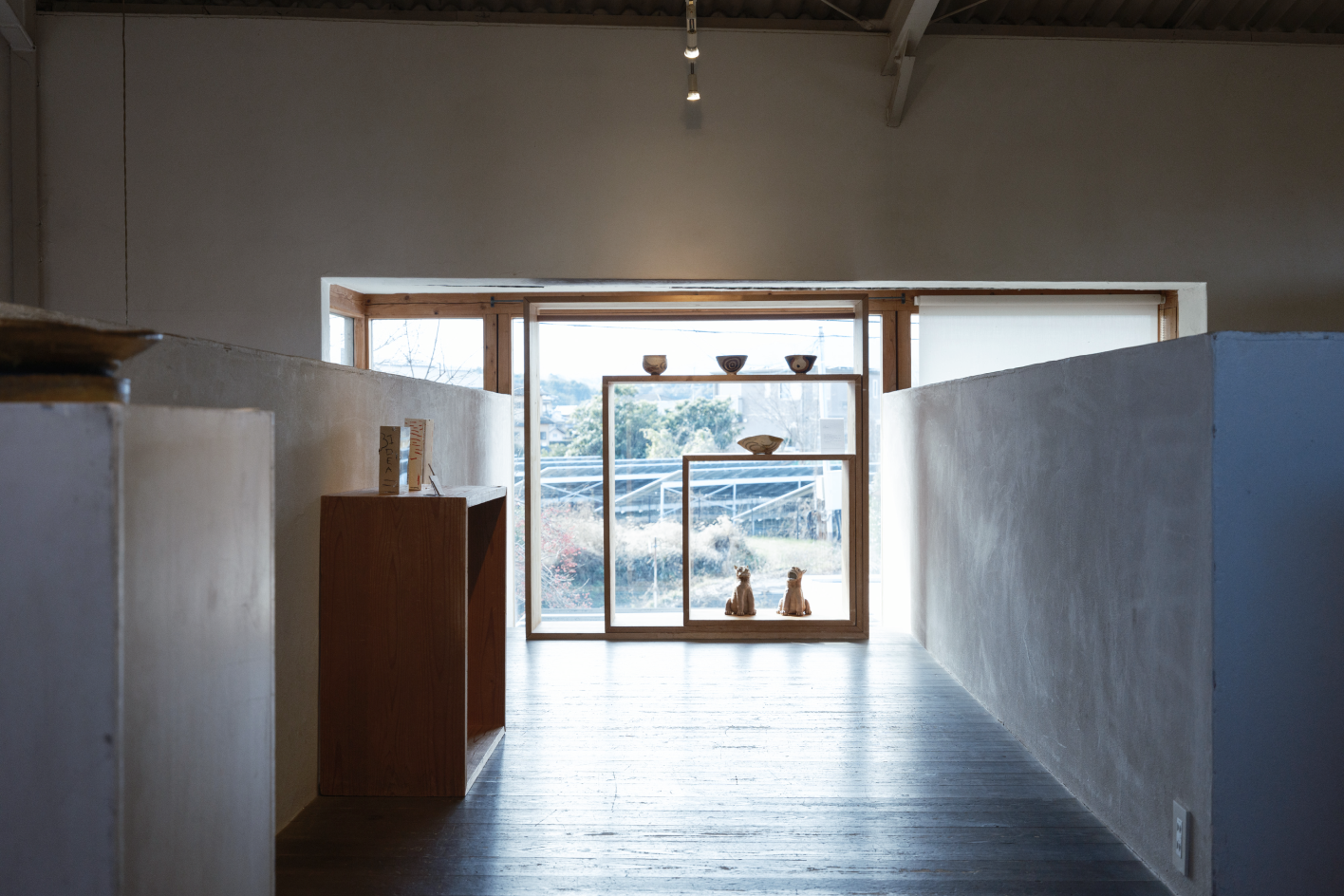 a room with a window and a table