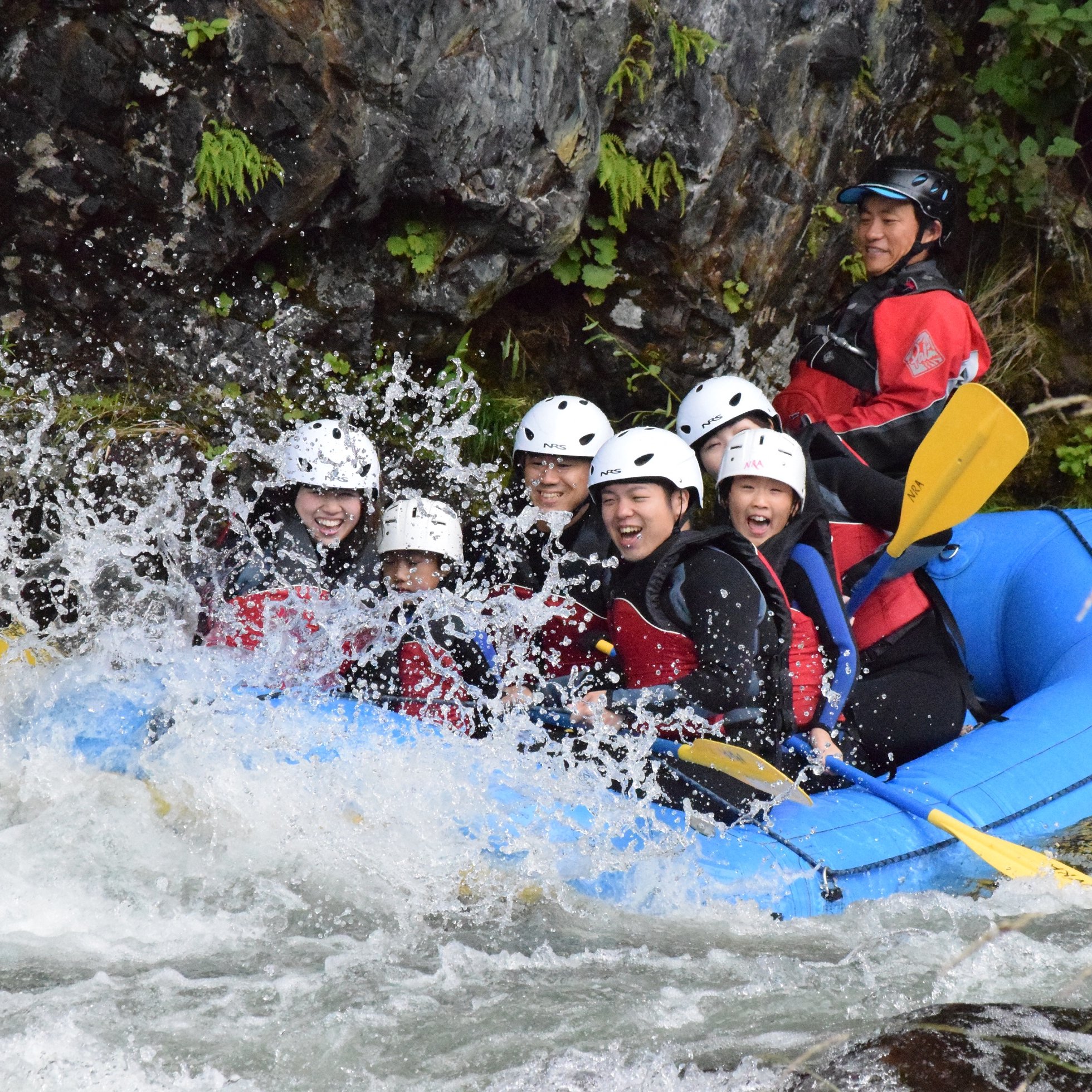 a group of people in a raft