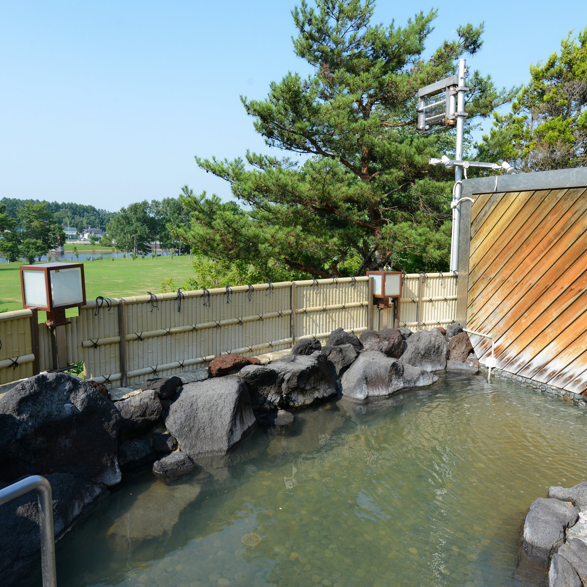 a pool of water with rocks around it