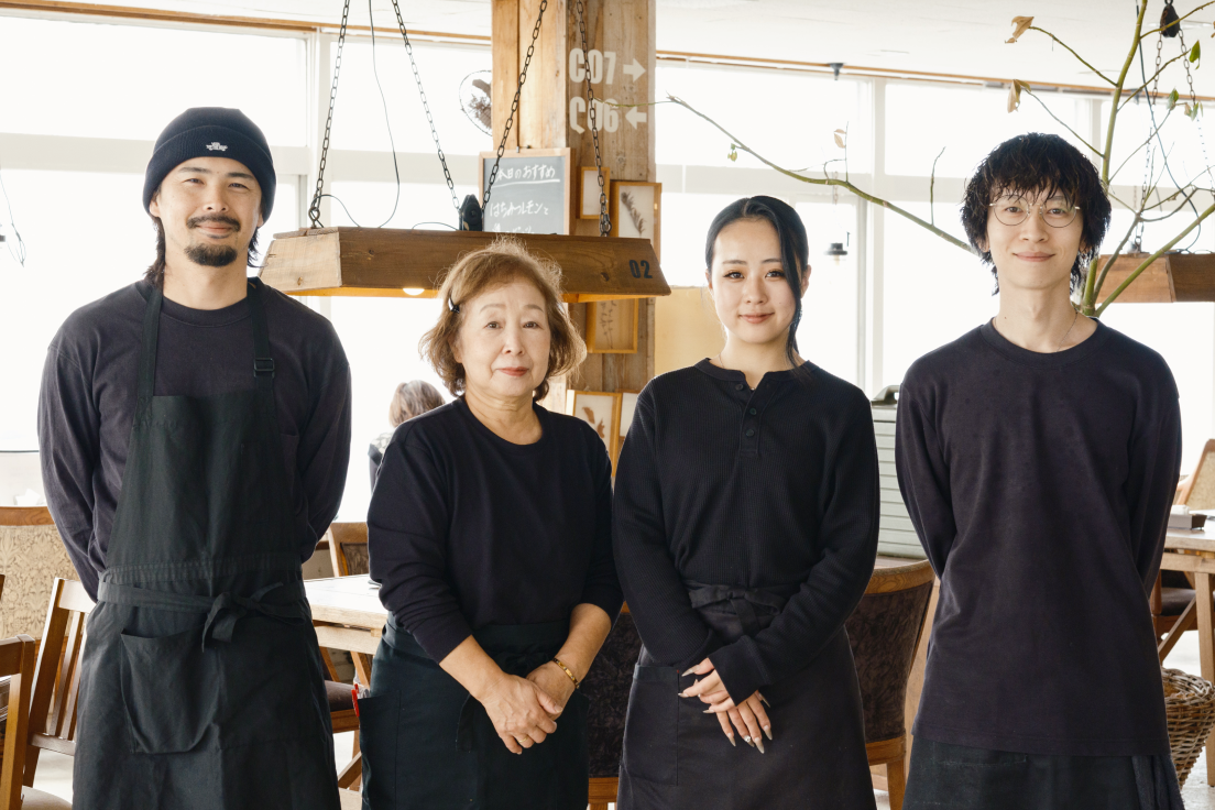 a group of people posing for a photo
