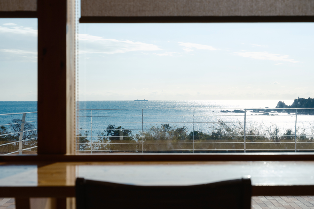 a view of the ocean from a window