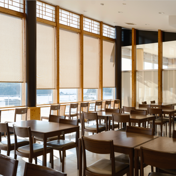 a room with tables and chairs