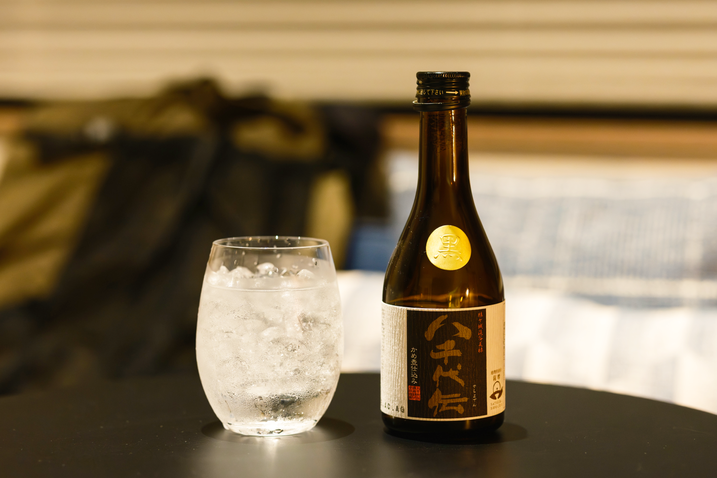 a bottle and glass of water