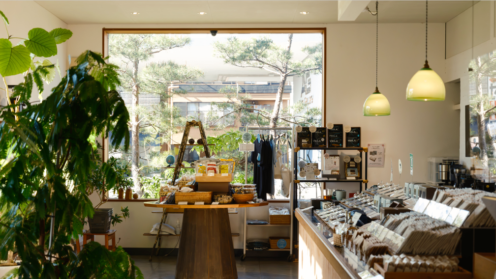 a store with a table and shelves with food items
