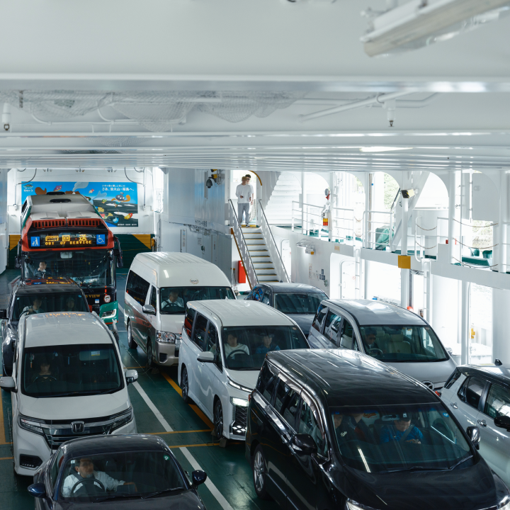a group of cars on a ferry