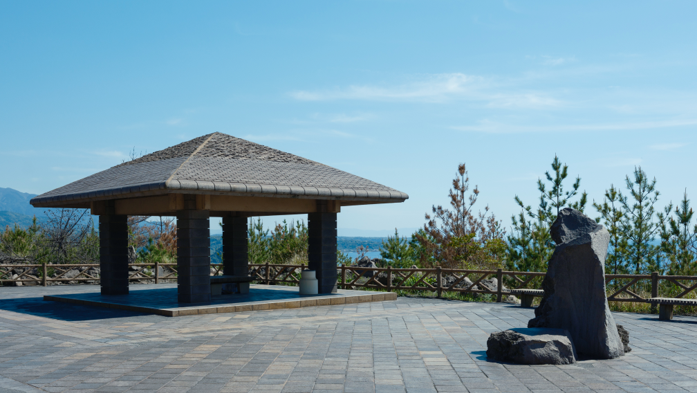 a stone gazebo on a stone patio