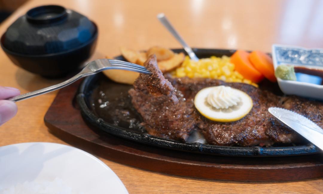 a plate of food with a fork