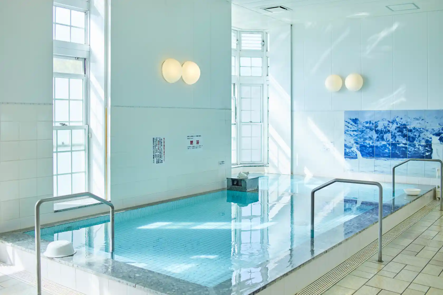 a indoor pool in a room
