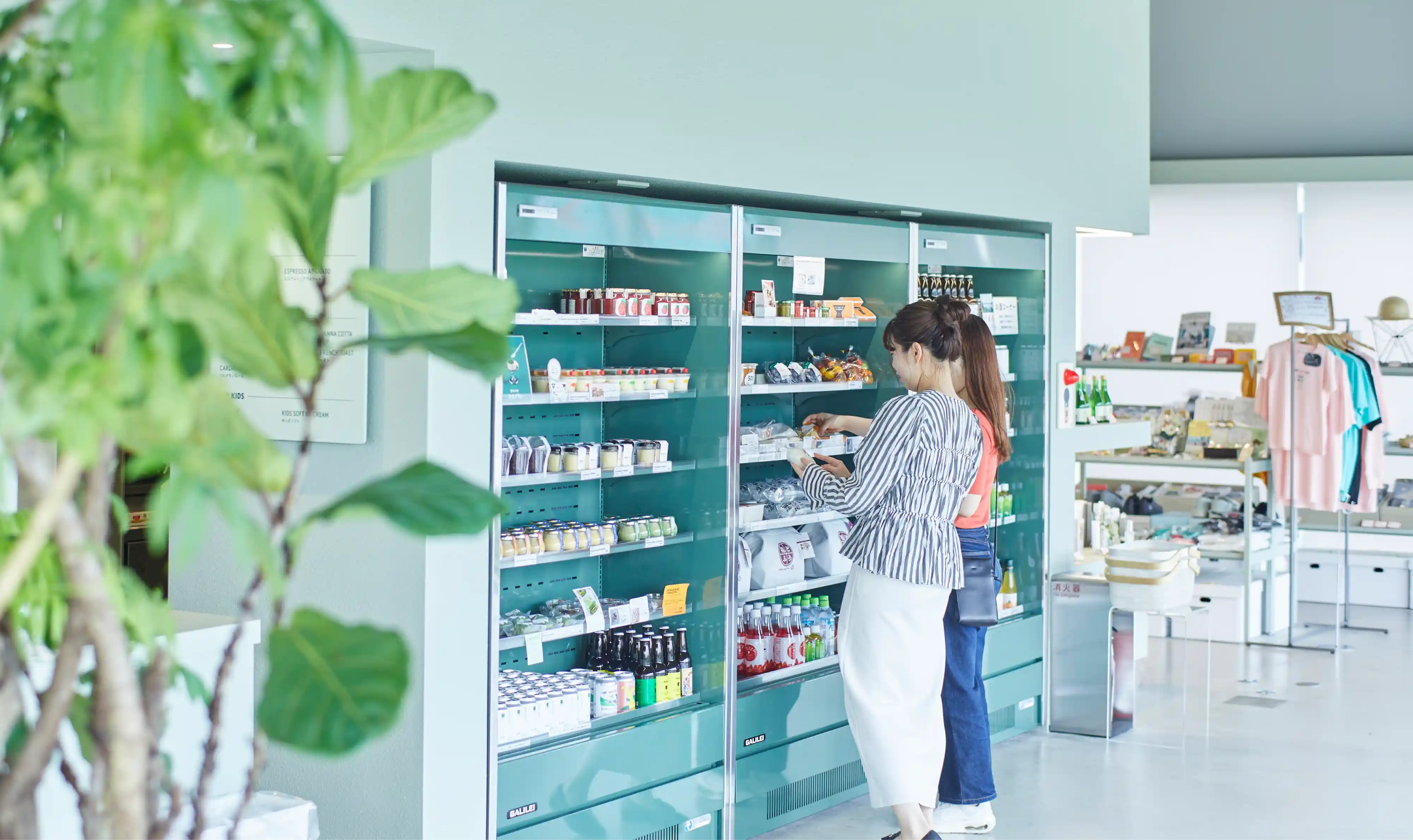 a woman looking at a shelf of food
