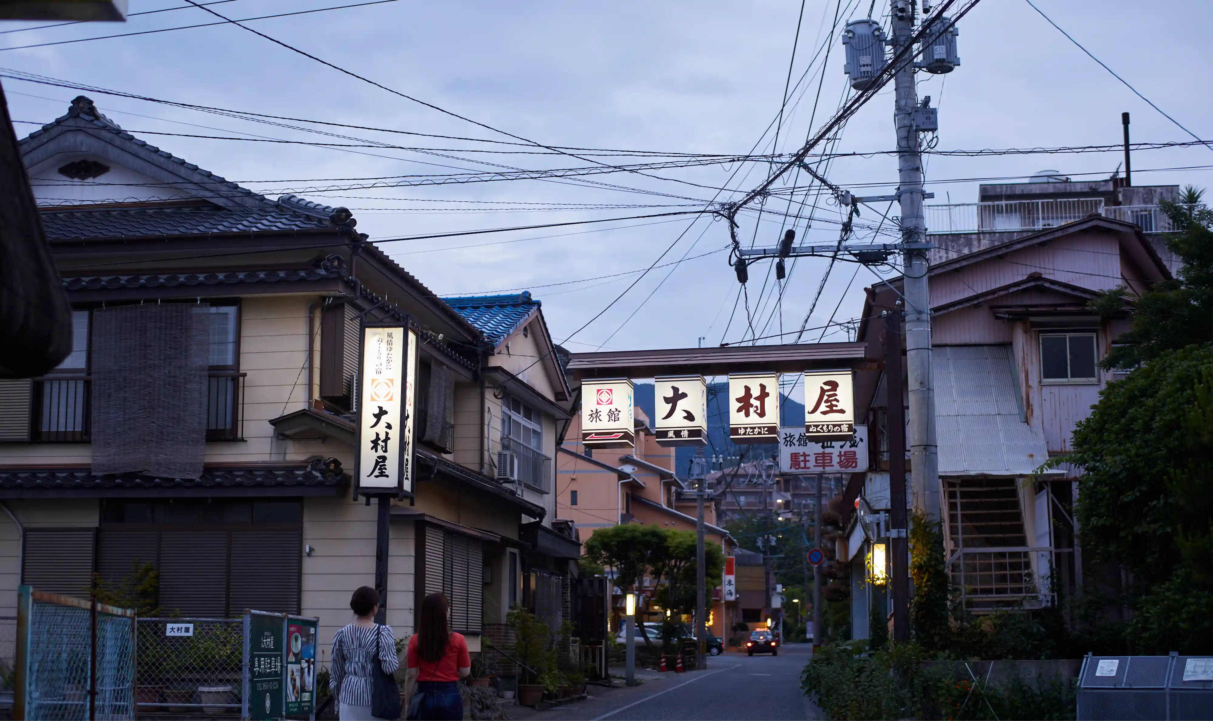 a street with buildings and signs