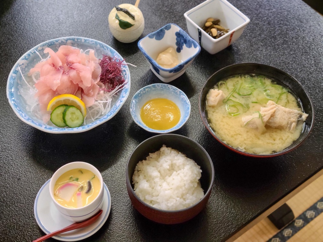 a table with bowls of food