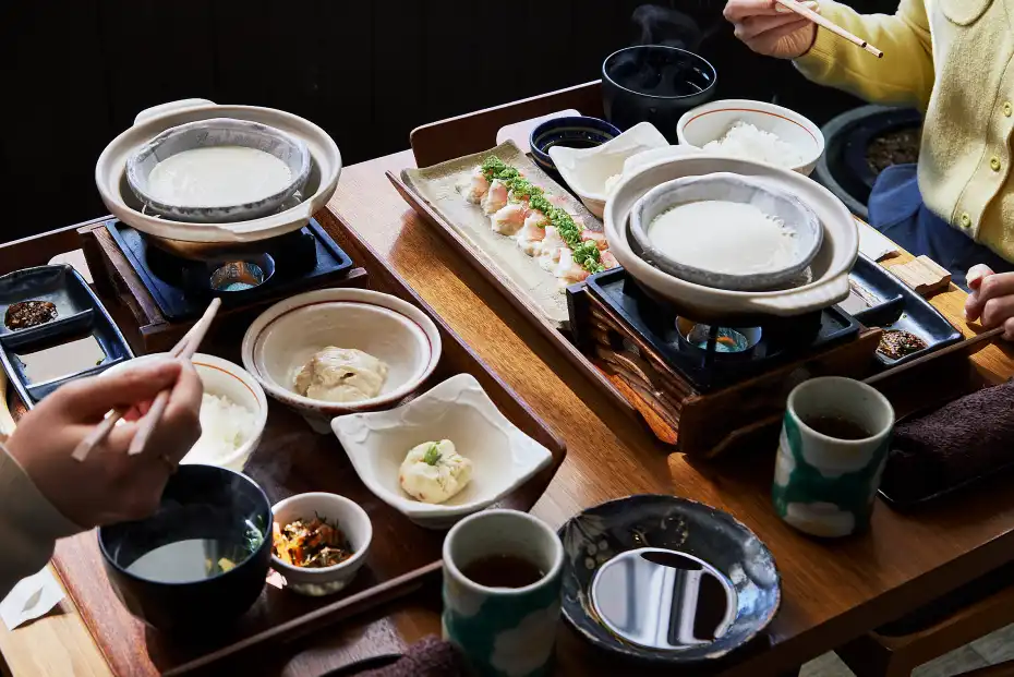 a table with bowls of food