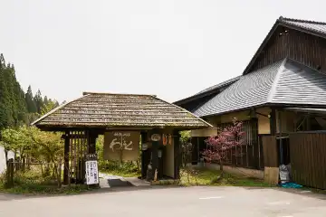 a building with a gate and a sign
