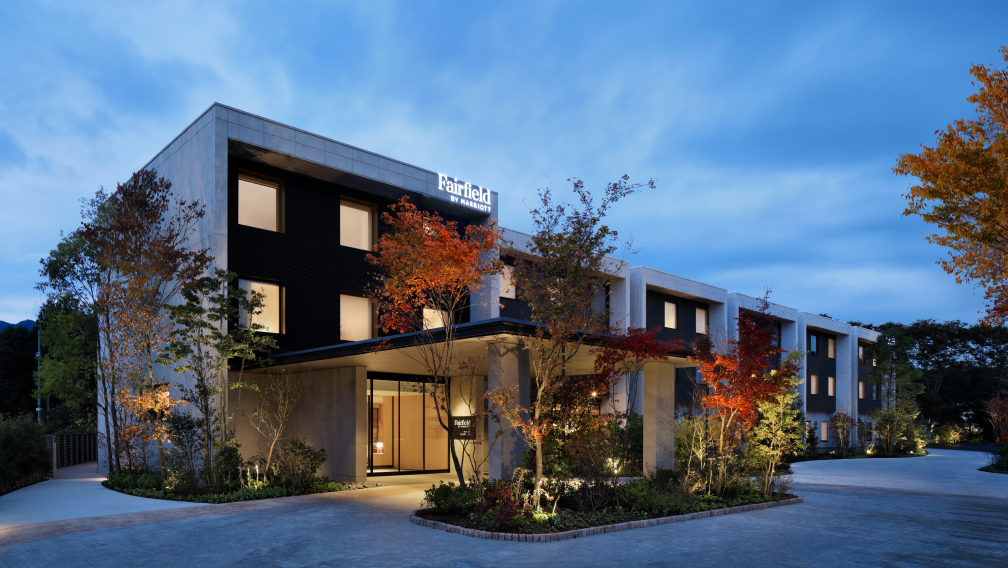 a building with trees in front of it