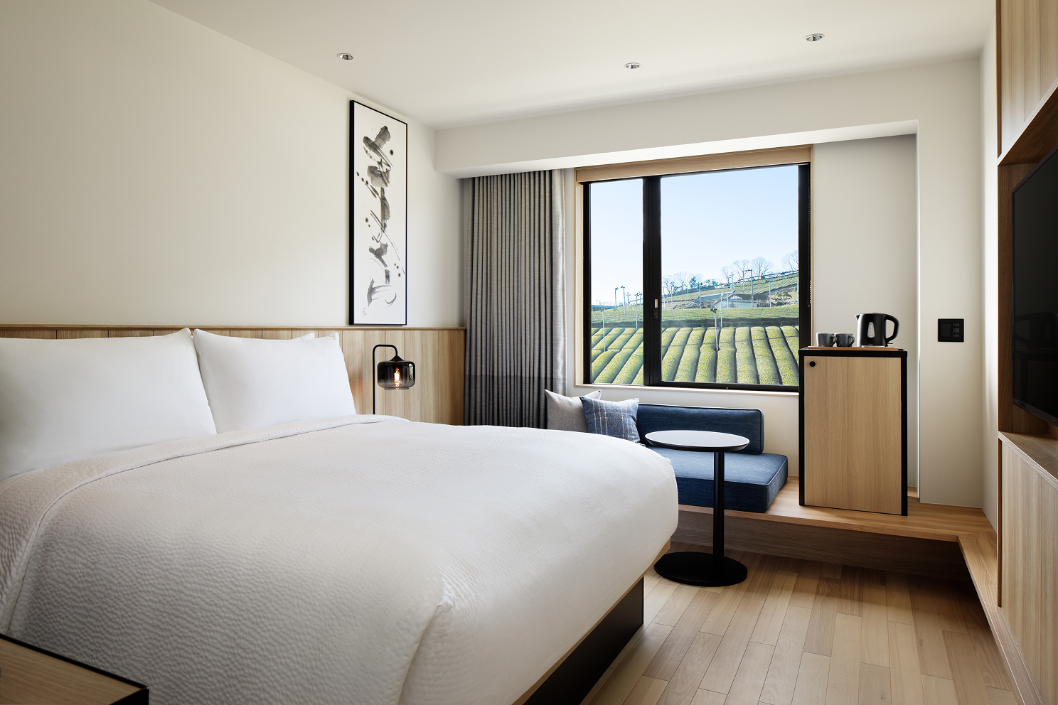a room with a bed and a window