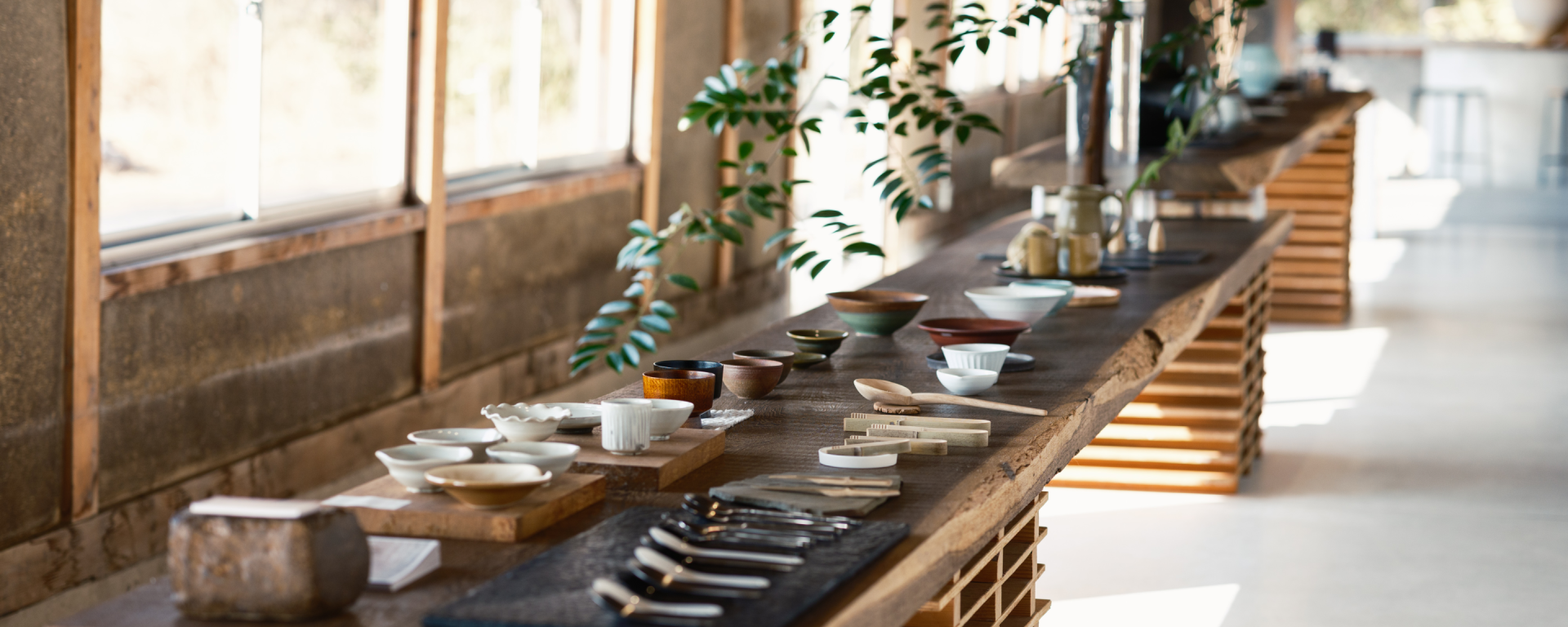 a table with bowls and knives