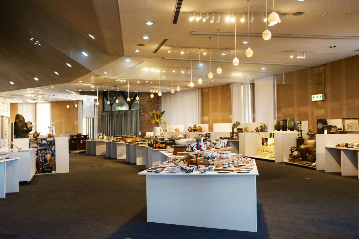 a room with a variety of dishes and objects