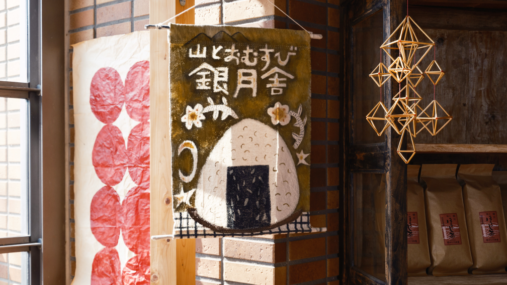 a sign on a brick wall