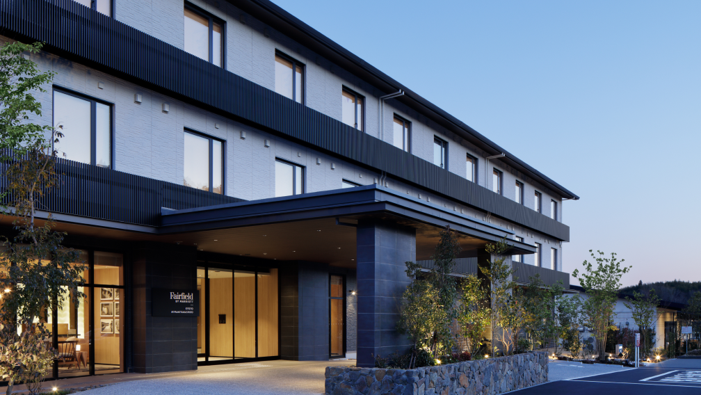 a building with a stone wall and a stone wall