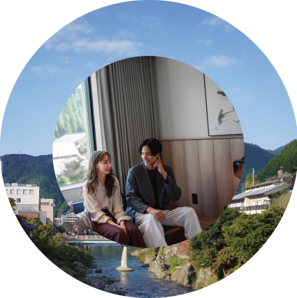 a man and woman sitting in a chair Japan accommodation