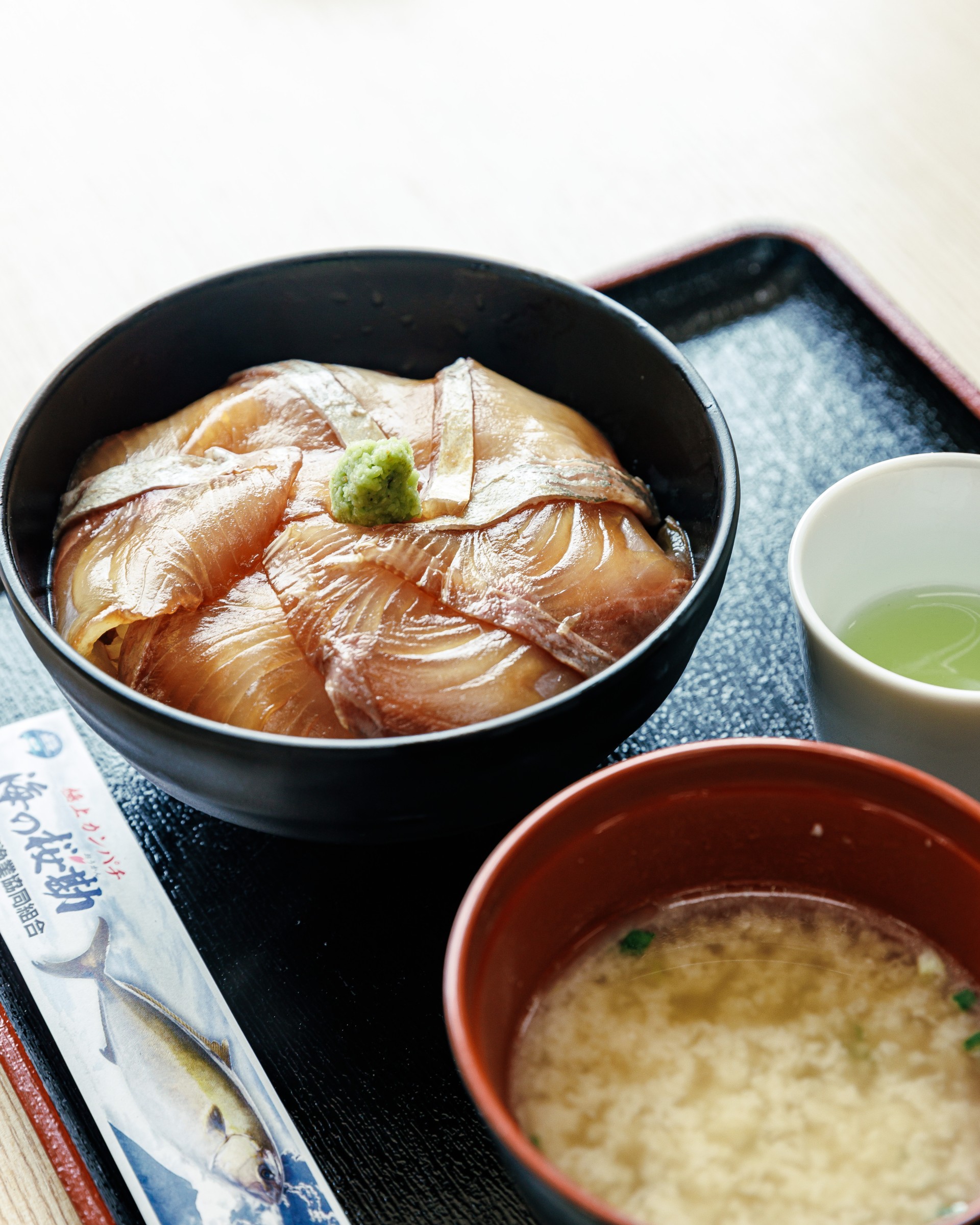 a bowl of food on a tray umino oukan