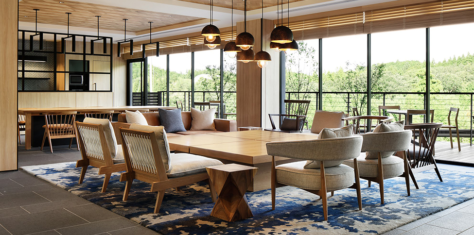 view of the lounge with a giant table and several chairs