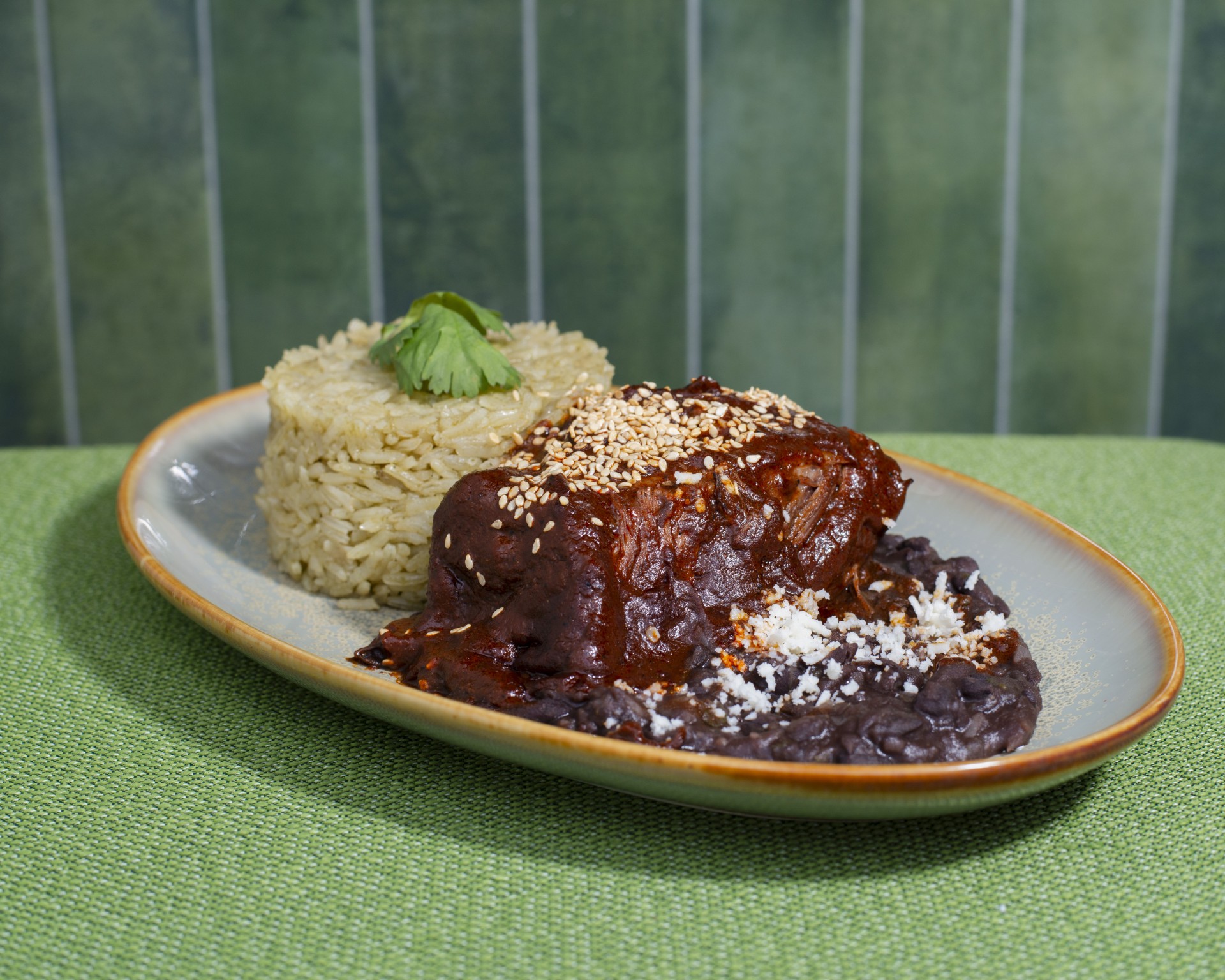 a plate of food on a green surface